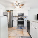 Kitchen with all stainless steel appliances.