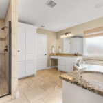 Walk-in shower, his/her sinks, soaking tub and huge walk-in closet.