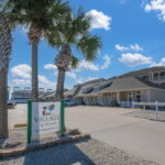WELCOME to Village by the Beach Townhomes!!