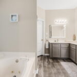 The owner's bath is beautiful. Jetted tub, dual sinks, separate shower, large walk-in closet.