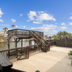 Elevated deck with boat lift.