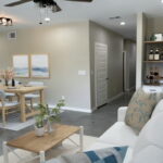 Open Living Area with Coffee/Dry Bar. Virtually Staged