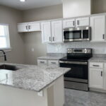 Granite Countertops and Farmhouse Sink