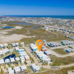 330 Paradise Pointe and the Gulf of America in the distance.