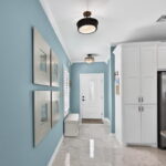 Front door entry coming towards the kitchen, dining and living.