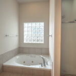 Garden jetted tub and separate shower.