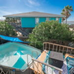 Above ground pool in the back yard.