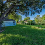 Huge backyard with mature trees! Perfect for the summertime shade!