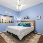 Second Bedroom with vinyl flooring.