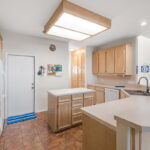 Spacious kitchen with center Island and tons of storage cabinetry.