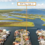 VIEWS into the ski-basin, the Gulf of Mexico and the Laguna Madre all in one area. NOTE the boat in the channel.