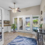 French doors lead out to Sunroom