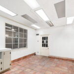 Bonus room with skylights for your plants. Door to the 2-car garage.