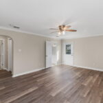 Primary bedroom with patio access.