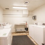 FIRST FLOOR coin operated washer/dryers for the complex.