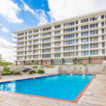 Pool, BBQ area, rear view of the complex. NO outdoor balconies. But, what VIEWS!!