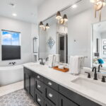 Dual sinks and designer finished in this primary bath!