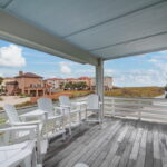 Second floor covered balcony with FOREVER gulf views.