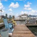 Boat dock with room for multiple water craft.