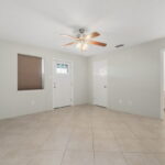 Upstairs Primary Bedroom and Bathroom with access to the private second level balcony.