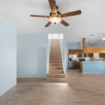 Living area, looking towards kitchen.