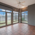 Screened in patio area. Tile flooring....add your patio furniture and plants.