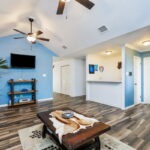 Living room with a wet bar.