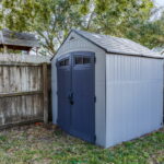 Storage shed located in backyard stays.