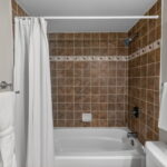 2nd bath with tile tub/shower.