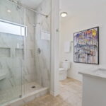 Hall bath area. Gorgeous walk-in shower.