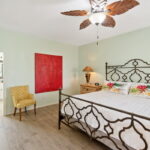 Primary bedroom is spacious for this King sized bed. LARGE walk-in closet.