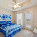 Another Bedroom With A Balcony Offering A Great View