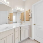 Primary bath area, with dual sinks, jetted tub, separate shower, and HUGE walk-in closet.