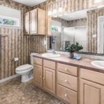Second floor bath with dual sinks.