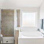 Primary Bathroom w/ separate tub and shower