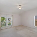Bedroom #1, looking out towards the front circular driveway
