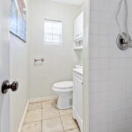 Bathroom with step-in shower.