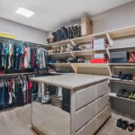 Primary Bedrooms walk-in closet.
