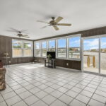 Second spacious living area/sunroom.