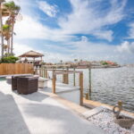 Stunning wide canal views and boat/fishing dock.