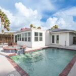 In-ground concrete pool and spa.