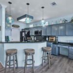 Kitchen with breakfast bar for extra seating.