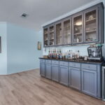 Dry bar in the living area is the perfect set-up for morning coffee and evening libations.