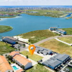 Aerial views of Lake Padre and Padre Island and location of the 4-building sites.