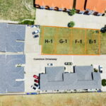 4-Building Sites - selling as a package. Less the common areas. From curb back 25' on the two common areas.