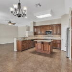 View into the kitchen and living area from the dining area.