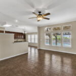 Living area with view in to the kitchen and dining area.