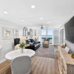 Dining area looking towards the living and out to the Gulf waters.