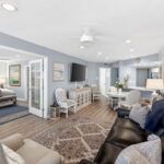 Living, dining and primary bedroom. New flooring throughout.