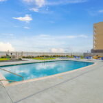 Imagine swimming in this pool that overlooks the Gulf waters!